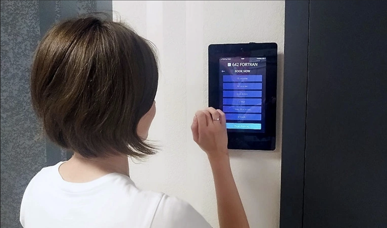 blurry photo of sunset over ocean with logo on top